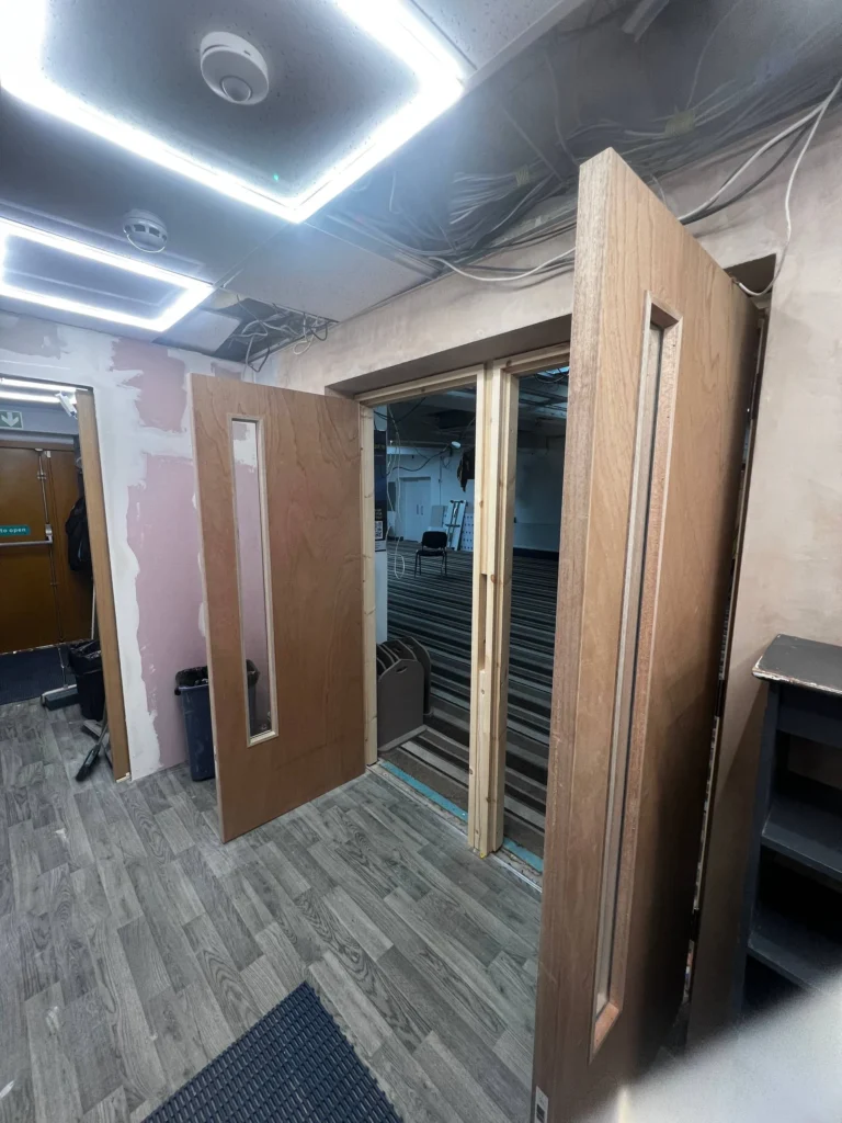 New entrance doors and surrounding work.