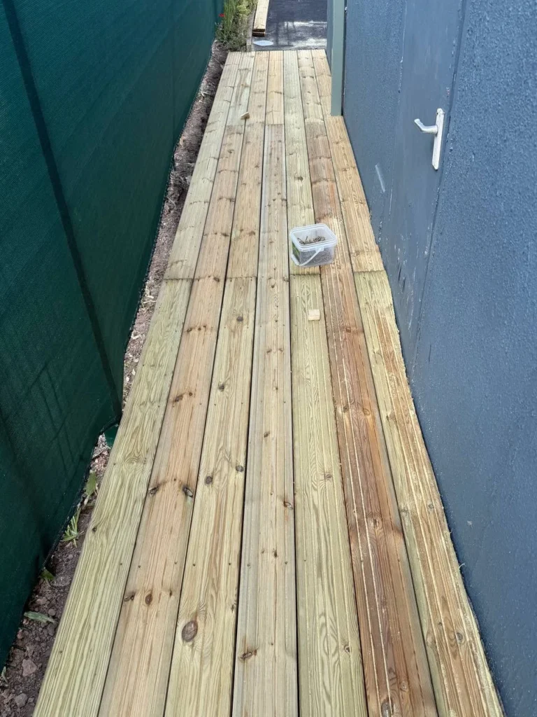 Decking installation in progress.