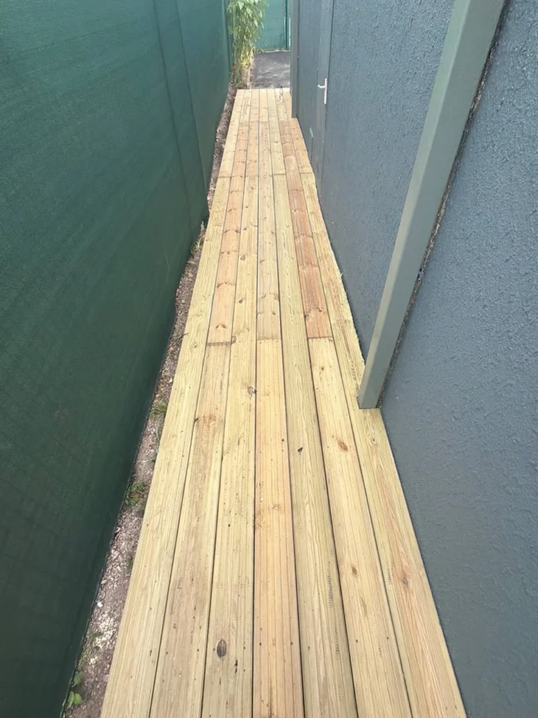 The completed walkway along the building.