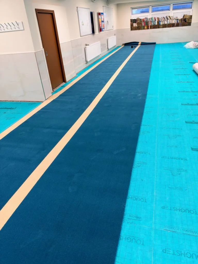 The first widths laid down the length of the musallā.