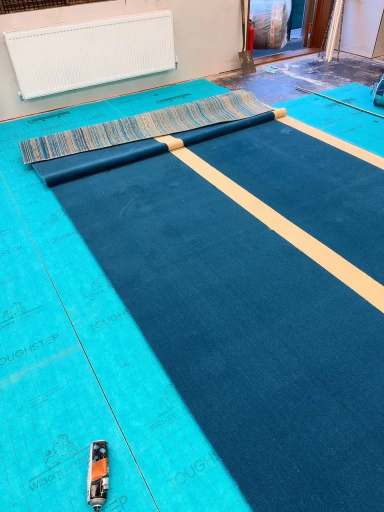 A new width unrolled beside the first.